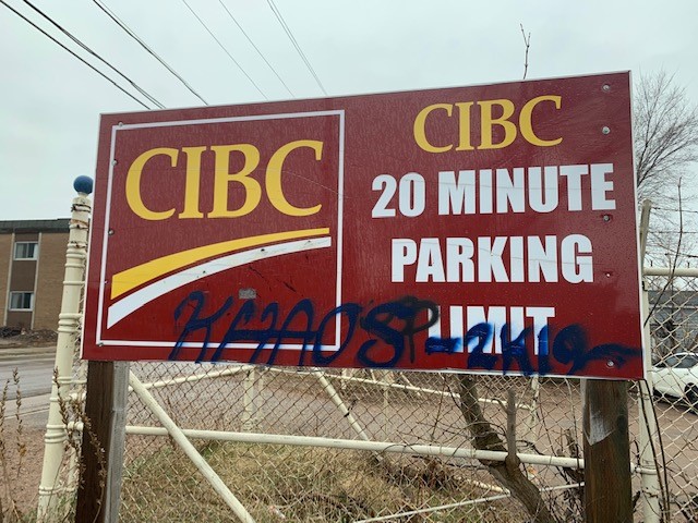 OPP Looking for Clues about Vandalized Bank Sign