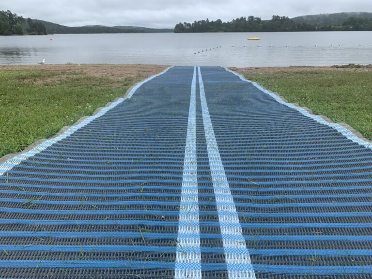 Mat and floatable chair make Lakeshore Park beach accessible   